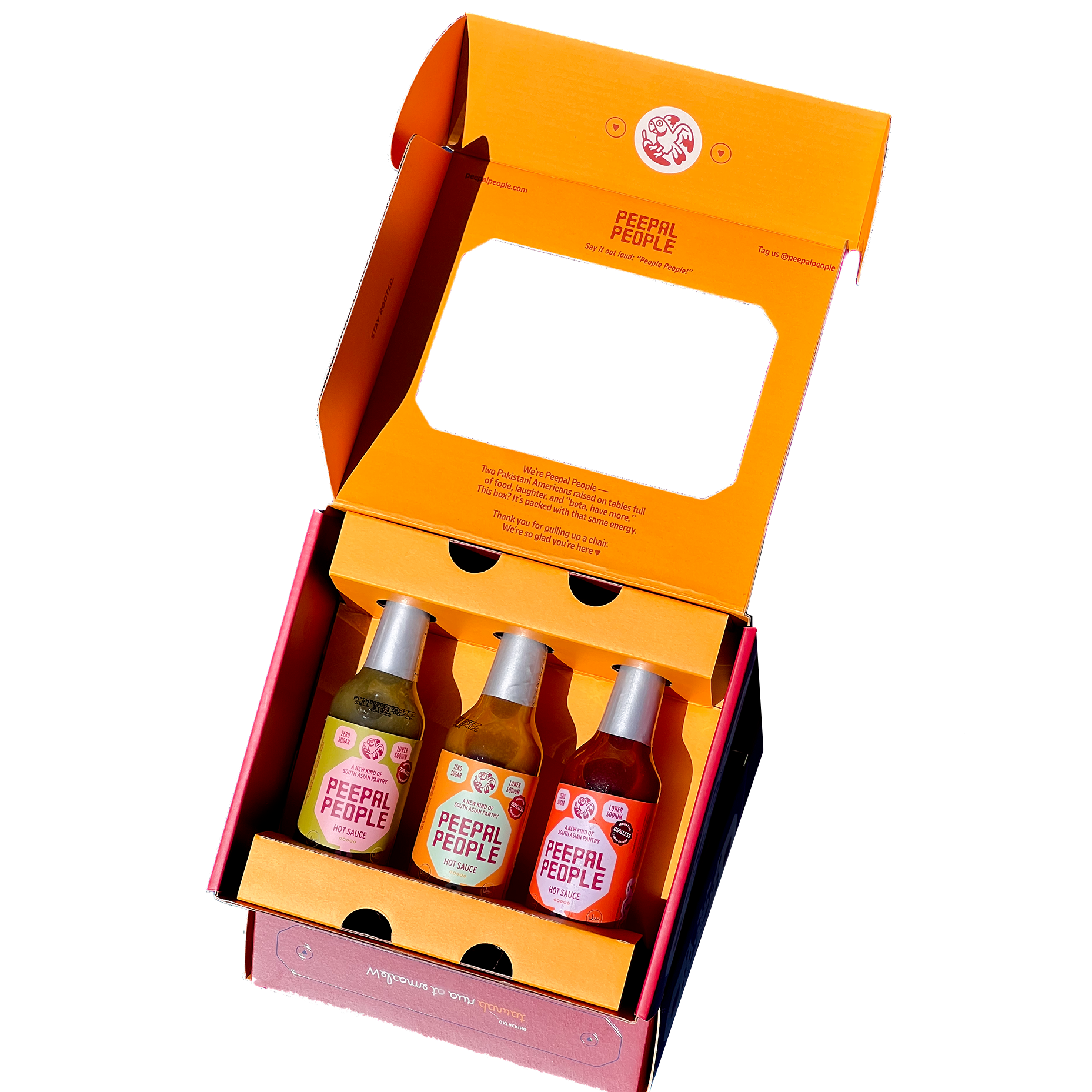 Set of four bottles in an open orange and pink box with 'Peepal People' branding.